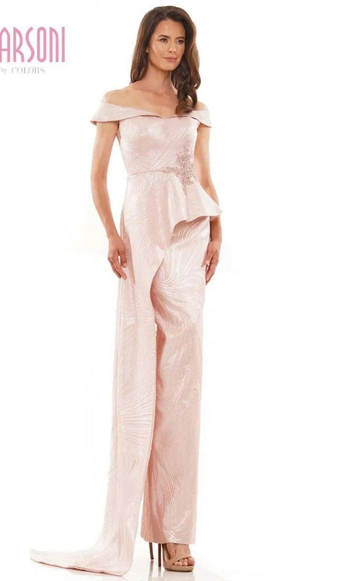 A woman wearing the Long Formal Dress: Marsoni MV1225 in rose, featuring off-shoulder sleeves, a peplum waist, and wide-leg pants, stands against a white background.